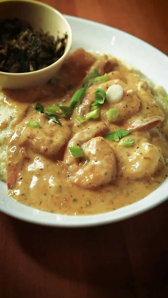 Shrimp and grits with a smoky Creole cream sauce
