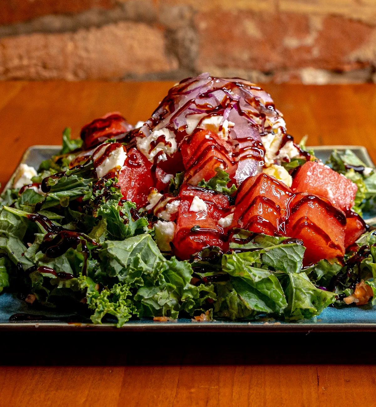 Strawberry and kale salad with balsamic drizzle